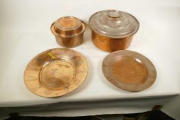 A quantity of Islamic copper cooking pots, plates etc