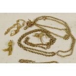 A collection of 9ct gold chains, pendants and charms etc gross 28 grams