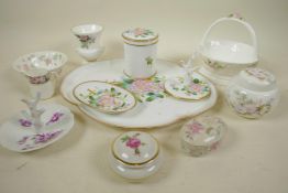 A collection of decorative porcelain including a floral decorated dressing table set, tray 11" x 9"