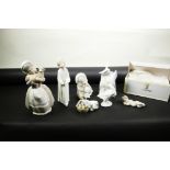 A collection of six Lladro collector's items; Baby Jesus, no.14535, Eskimo child with polar bear