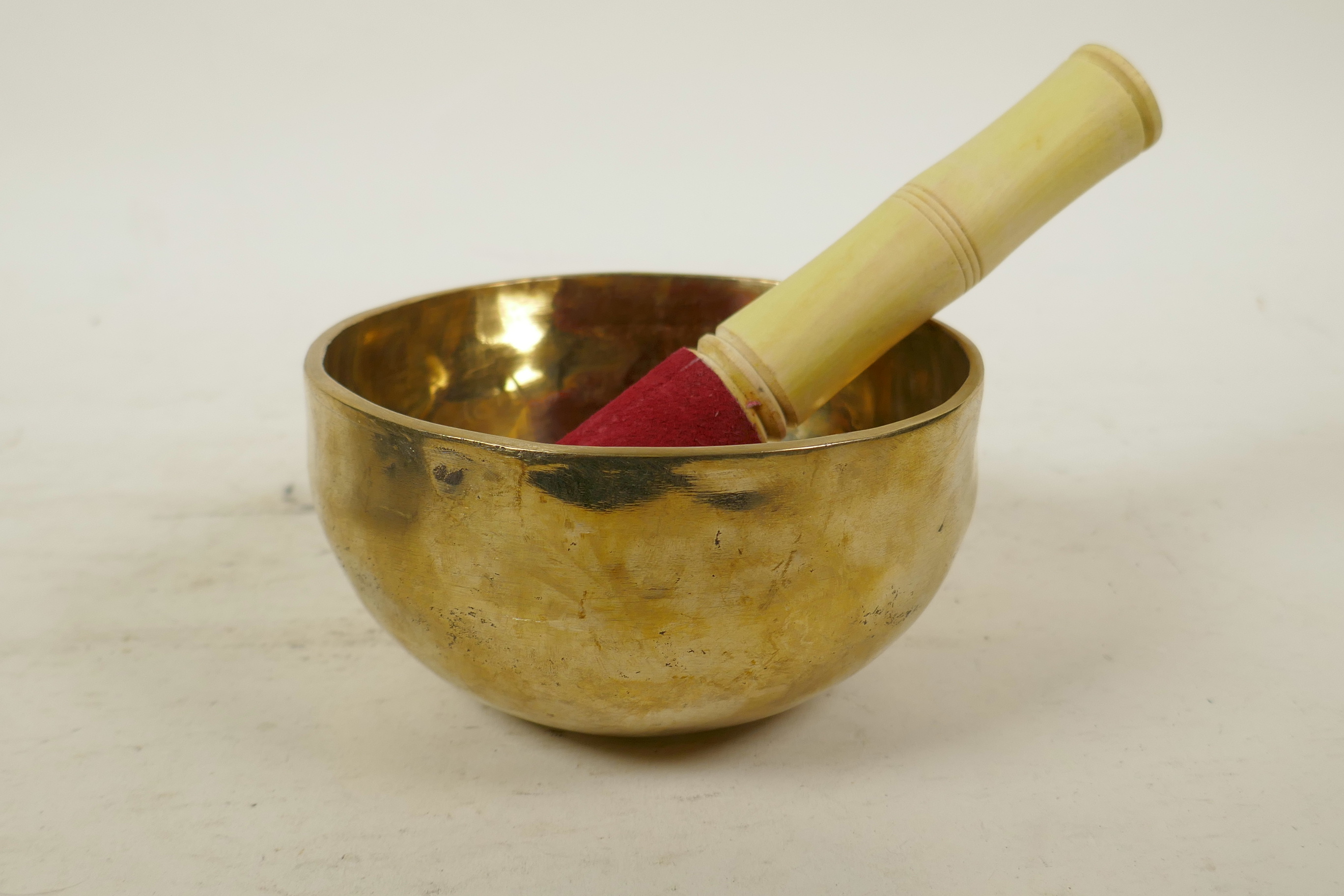 A Tibetan gilt bronze singing bowl, and another with character script decoration to exterior and - Image 2 of 7