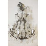 An iron and crystal drop chandelier, 26" high, 23" diameter