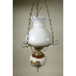 A mid century milk glass hurricane hanging lamp, being a swag light fixture suspended by a trio of