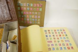 Two albums of world stamps and a box of assorted loose stamps etc