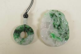 A Chinese carved mottled green jade pendant with carp and lotus flower decoration, and another green