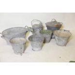 A quantity of vintage galvanised garden buckets and a watering can
