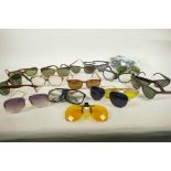 A collection of vintage sunglasses including Ray Bans