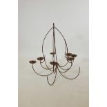 A wrought iron ten branch chandelier, A/F, 33" long