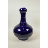 A Chinese powder blue glazed pottery garlic head shaped vase, 13" high