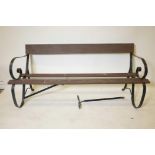 A vintage wrought iron garden bench, 62" long