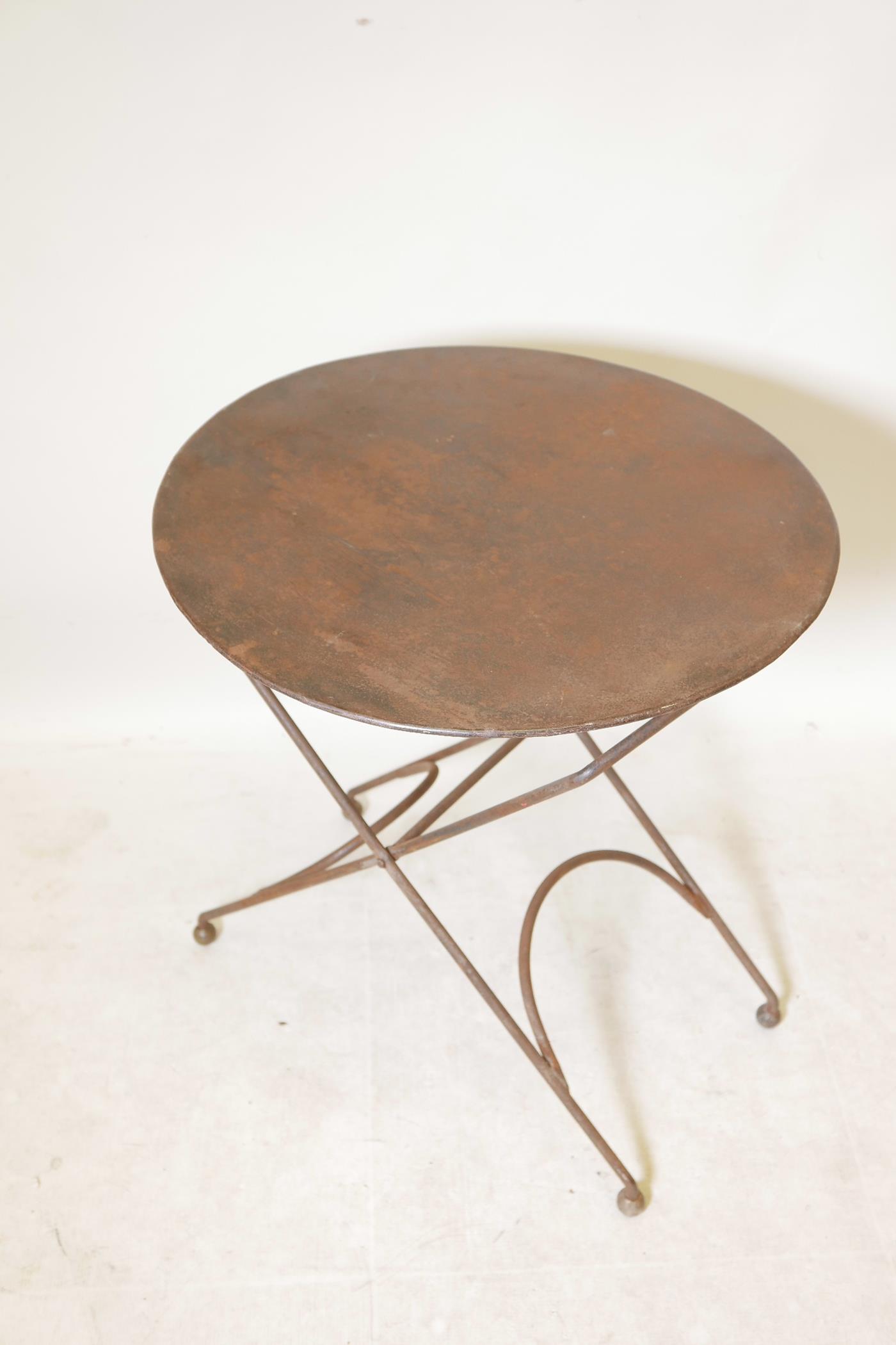 A French wrought metal folding cafe table, 23½" diameter - Image 2 of 2