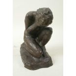 A stylised bronze figure of a kneeling nude girl with her knee in her hands, 7" high