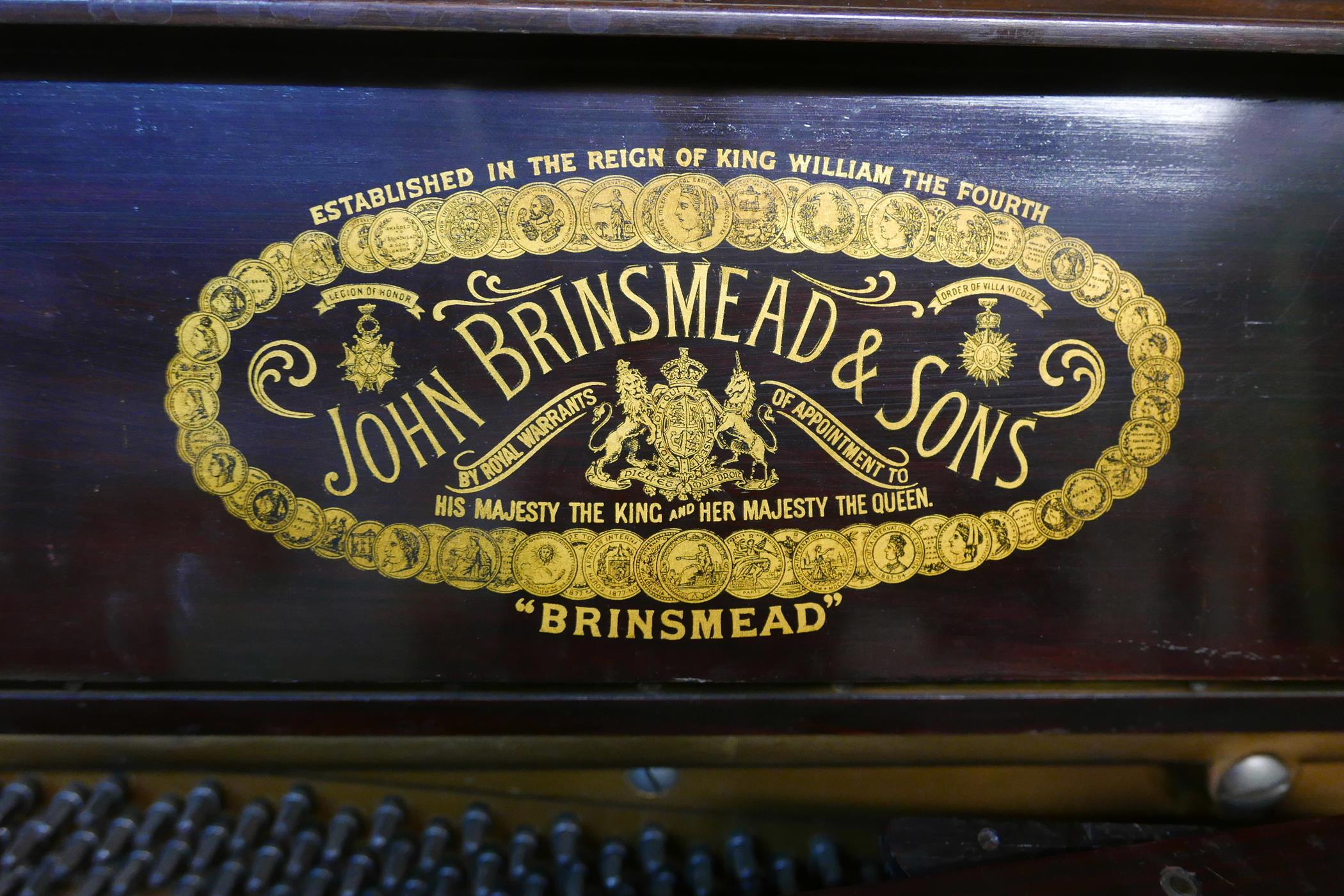 A John Brinsmead and Sons upright piano, with a rosewood case and iron frame, 56" x 26" x 51" - Image 3 of 6