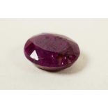 A 12.06ct red ruby, oval mixed cut, IDT certified, with certificate