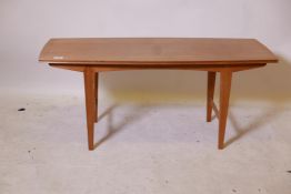 A mid-century Vanson mahogany occasional table with bow shaped top, raised on tapering supports, 42"