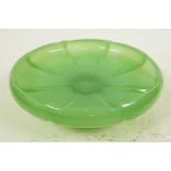 A green Peking glass bowl formed as a lily pad, 7½" diameter