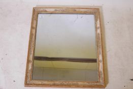 A C19th French Empire frame with fine composition and gessoed finish, and antique mercury glass