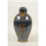 A Chinese Cizhou kiln pottery vase, with character mark decoration and four lug handles, 10½" high