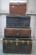 A leatherette and metal bound ply storage trunk, a wood and metal strapped travel trunk, and two