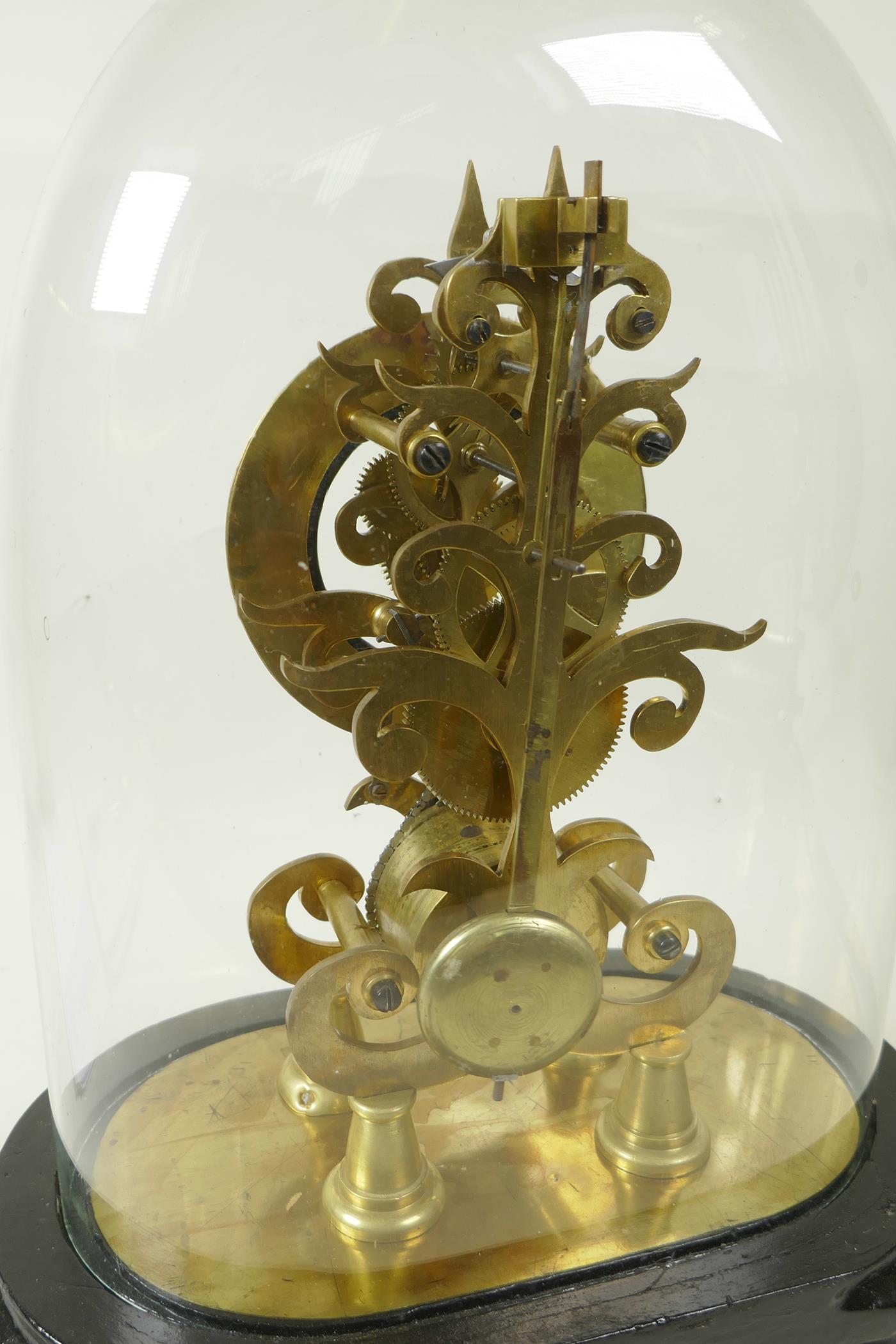 A replica brass skeleton clock with fusee movement and blue enamel chapter ring in Roman numerals, - Image 4 of 5