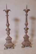 A good pair of C18th watergilt wood pricket candlesticks, 31" high