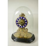 A replica brass skeleton clock with fusee movement and blue enamel chapter ring in Roman numerals,