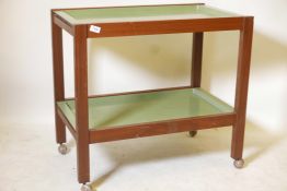 A mid century walnut hostess trolley with two removable inset trays, 30" x 18" x 28"