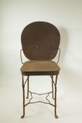 An Indian wrought iron child's chair, 22½" high