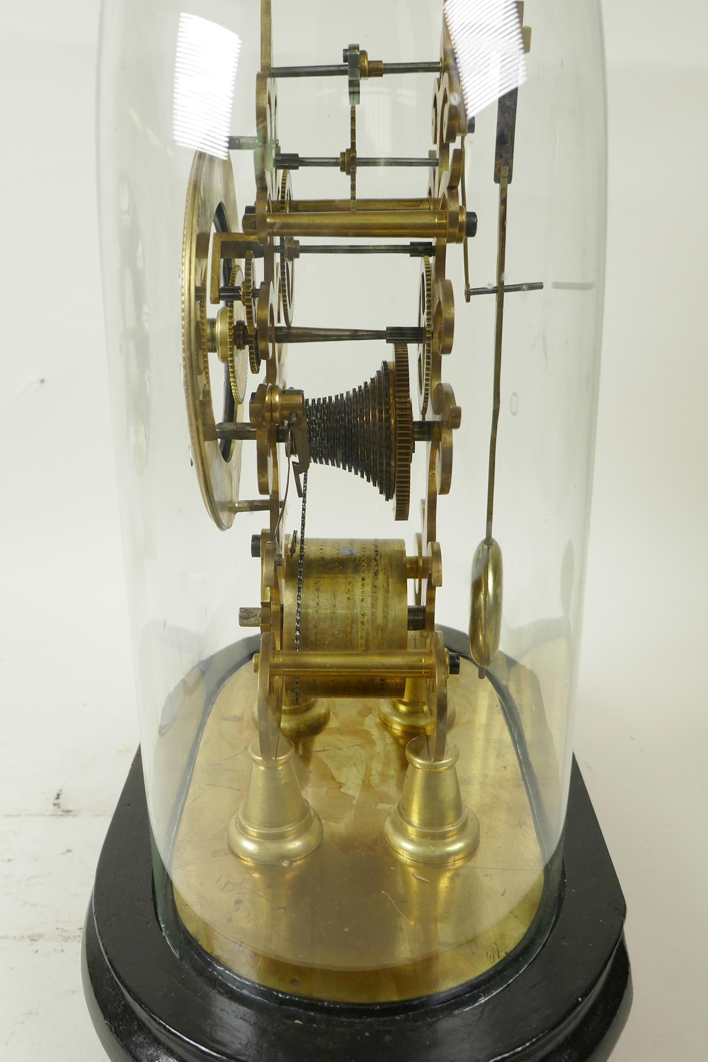 A replica brass skeleton clock with fusee movement and blue enamel chapter ring in Roman numerals, - Image 3 of 5