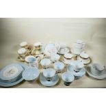 A quantity of porcelain including a pair of Limoges Philippe Deshoulieres Orleans pattern teacups