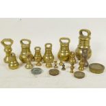 A box of brass bell weights etc