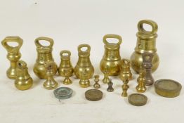 A box of brass bell weights etc