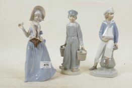 Two Lladro figures of boys, and another porcelain figure of a girl with flowers, 9" high
