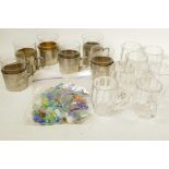 A set of six toddy glasses in engraved pewter holders, together with seven custard glasses and a bag