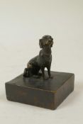 A Chinese bronzed metal seal with a dog knop, 3" high, 2" x 2"