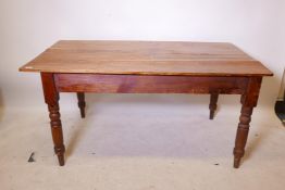 An early C20th pine scullery table with single end drawers, raised on turned supports, A/F, 31" x