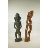 An unusual African carved wood tribal figure, A/F, and another African carved and painted wood