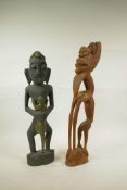 An unusual African carved wood tribal figure, A/F, and another African carved and painted wood