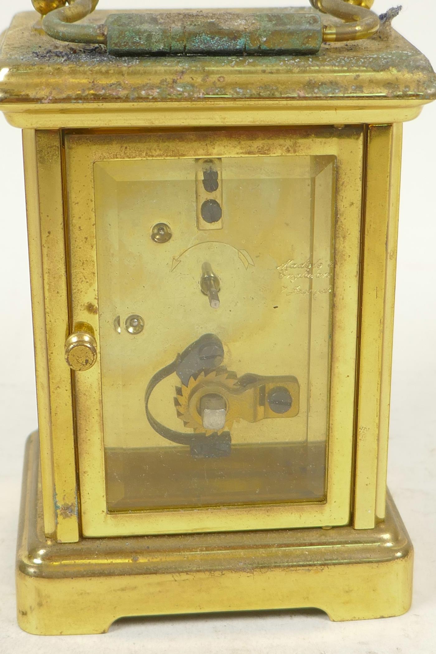 A brass cased carriage clock from the London Clock Company with white enamel dial and Roman - Image 4 of 4