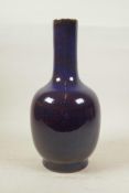 A Chinese purple flambe pottery vase, 13" high