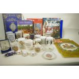 A collection of Royal commemorative books, papers, tankards, miniature cups and saucers etc from