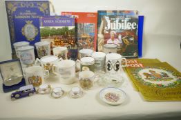 A collection of Royal commemorative books, papers, tankards, miniature cups and saucers etc from