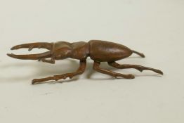 A Japanese jizai style bronze stag beetle, 2½" long