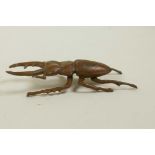 A Japanese jizai style bronze stag beetle, 2½" long