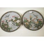 A pair of Japanese Meiji (1868-1912) cloisonne chargers, decorated with cranes and blossom, 12"