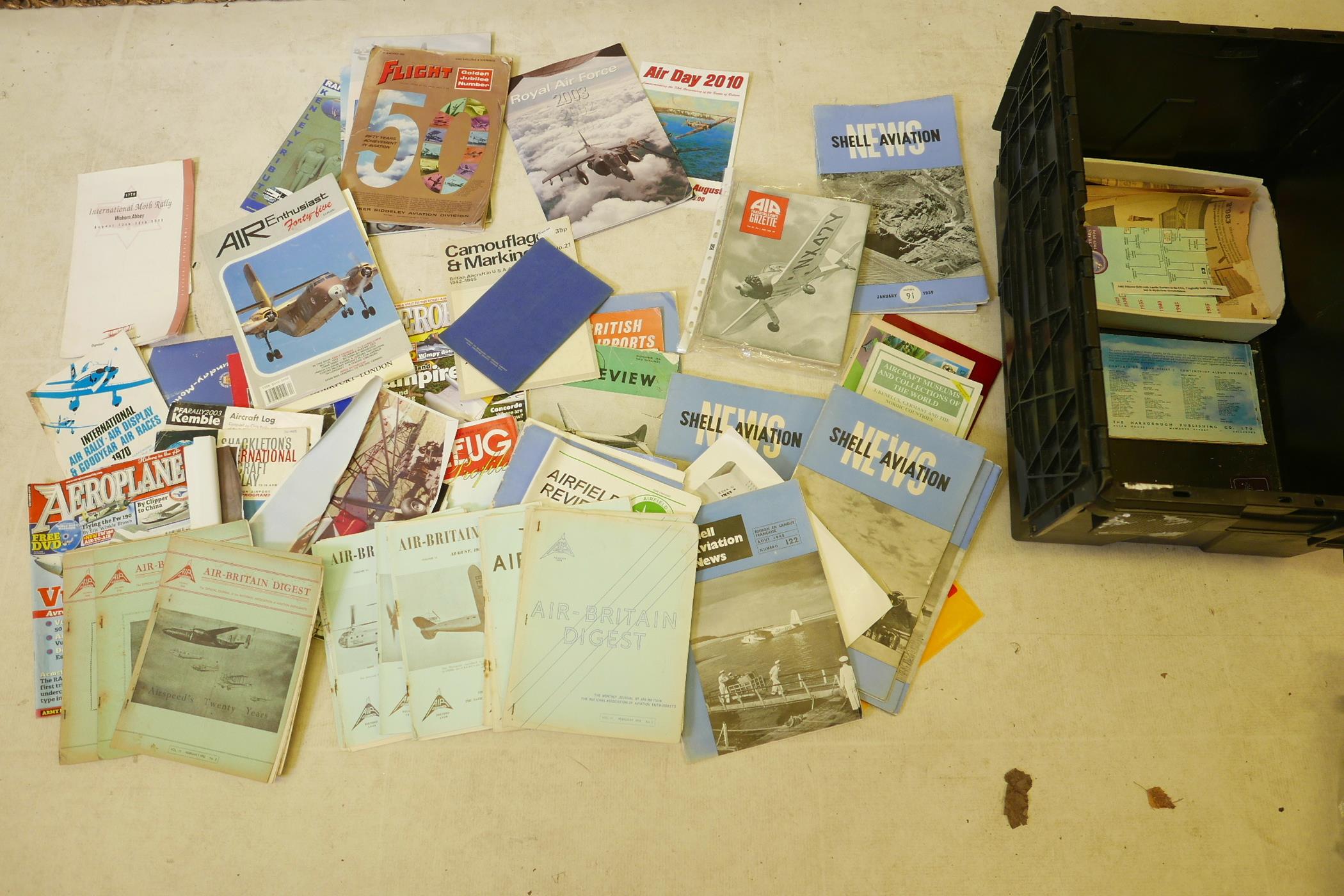 A box of aviation magazines and ephemera including early copies of the Air Britain Digest, Shell