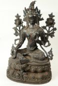 A Sino-Tibetan detailed bronze figure of Buddha seated in meditation on a lotus throne,