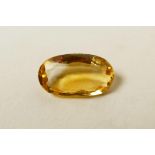 A 2.40ct natural citrine, oval mixed cut, certified by the Gemological Laboratory of India, with
