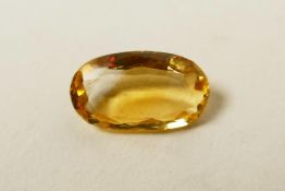 A 2.40ct natural citrine, oval mixed cut, certified by the Gemological Laboratory of India, with