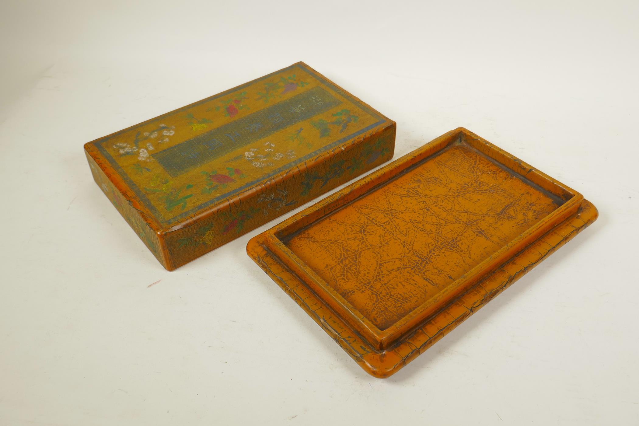 A Chinese orange lacquer scribe's box with engraved, painted and gilt decoration of Asiatic flora, 6 - Image 3 of 4